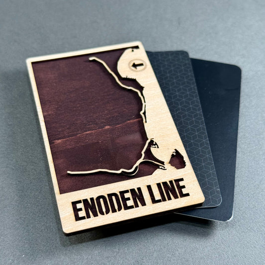 Wooden mini map of the Enoden Line shown beside credit cards for size comparison